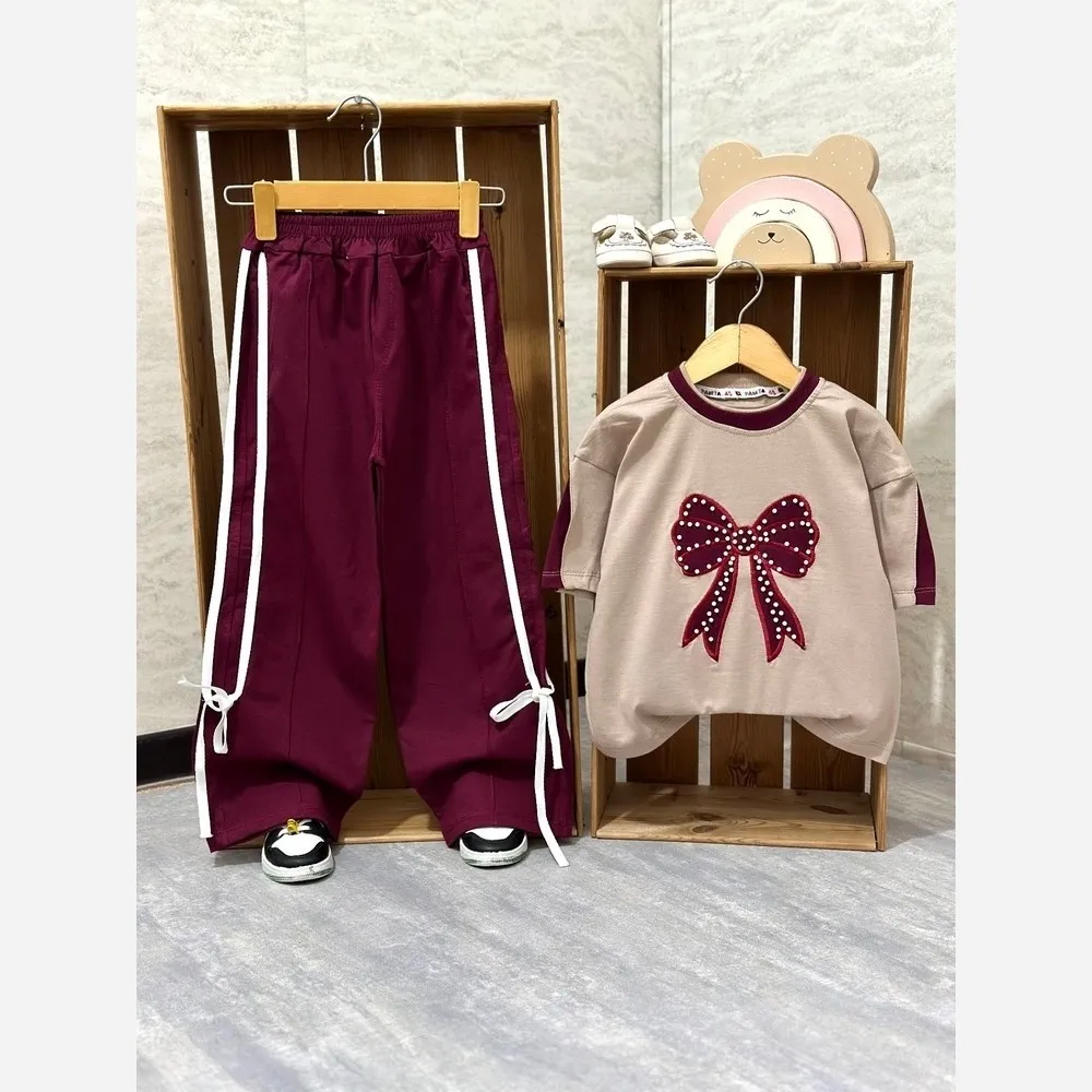 ست تیشرت و شلوار دخترانه پنبه لاکرا پاپیون مرواریدی لش استایل سایز 45 تا 65